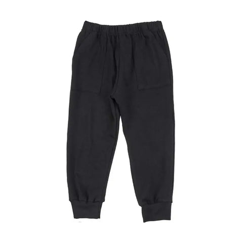 The Spiritex | Sustainable Apparel Youth Jersey Jogger Pants are black organic cotton kids joggers with an elastic waistband, two front patch pockets, and cuffed ankles, made in the USA with low impact dyes. Shown flat on a white background.