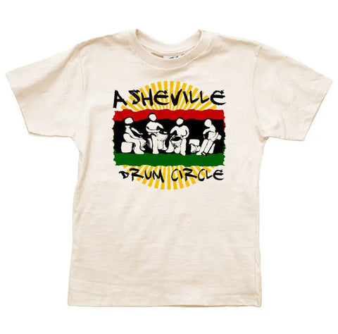 The Rasta Asheville Drum Circle Graphic Tee (Y) by Spiritex | Sustainable Apparel is a cream organic cotton kids shirt with silhouetted drummers, “ASHEVILLE DRUM CIRCLE” text, a yellow sunburst, and red, yellow, green & black bands.