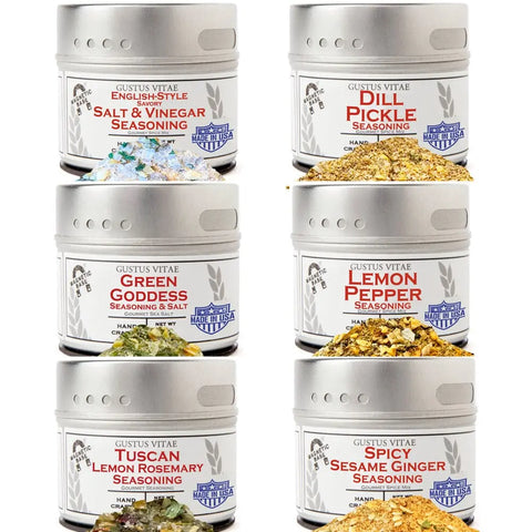 Six tins from the Gustus Vitae Zesty & Bright Seasoning Set are displayed in two columns, featuring flavors like Salt & Vinegar, Dill Pickle, Green Goddess, Lemon Pepper, Tuscan Lemon Rosemary, and Spicy Sesame Ginger.